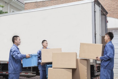 Office relocation team preparing equipment for a Brixton business move