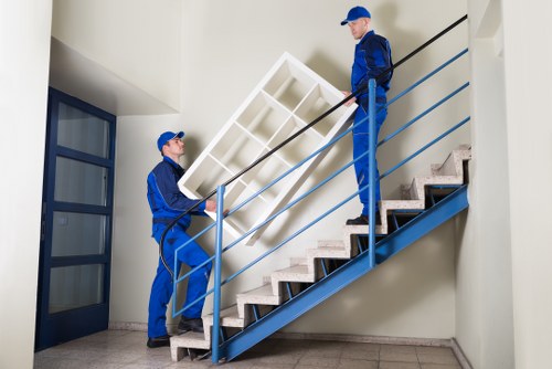 Local house removalists unloading furniture at a Brixton home