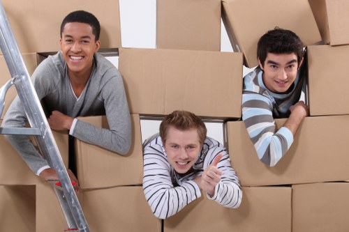 A local removals team loading household items for a Brixton move
