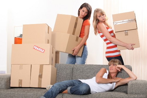 Packing supplies and labelled cartons prepared for a Brixton move