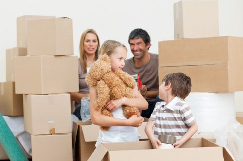 Removal van loading household items for a Brixton move