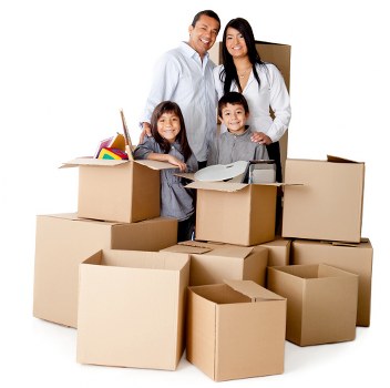 Movers carrying furniture through a Brixton property staircase